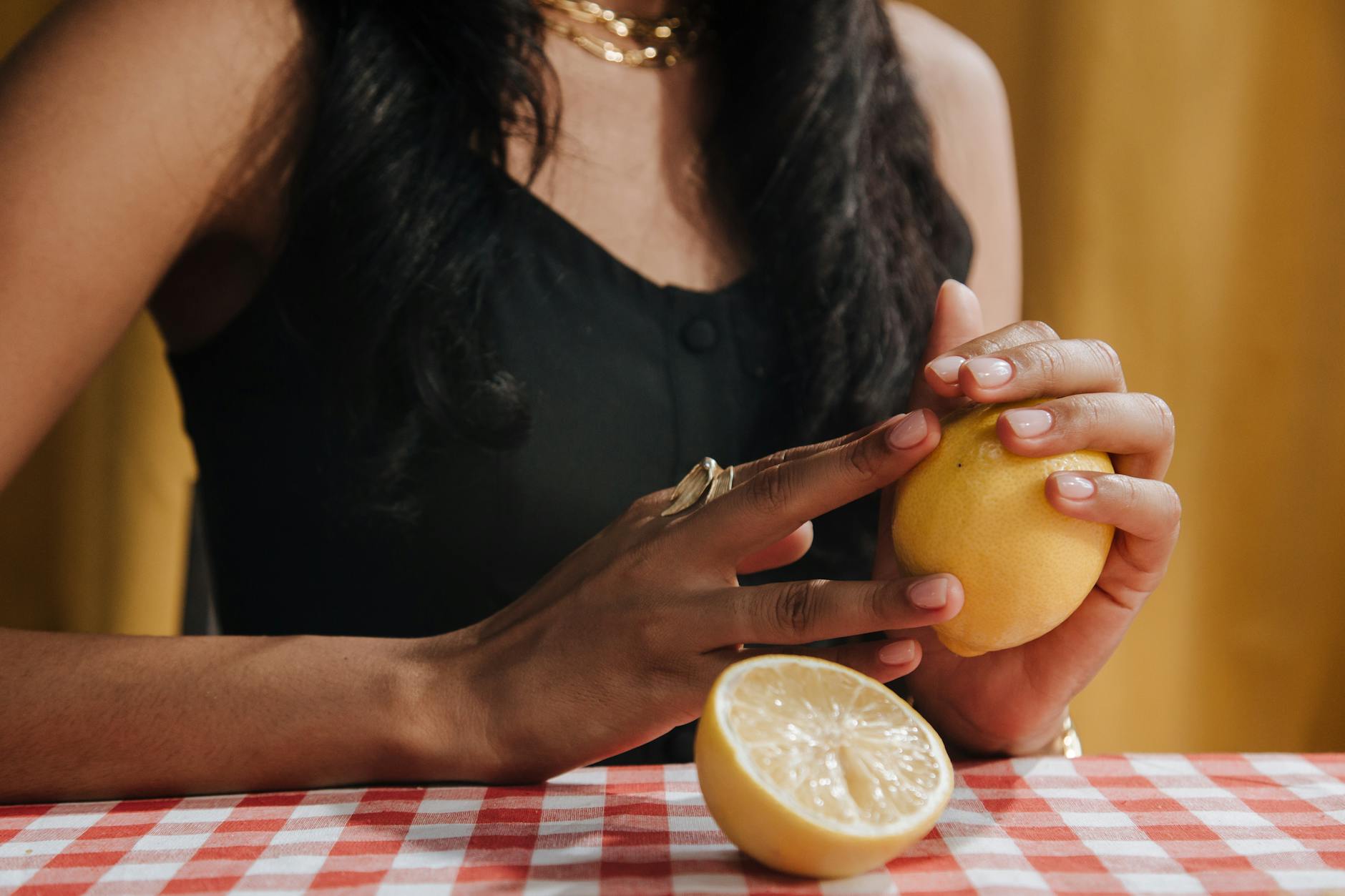 Hands holding a blue vibrator against a purple background, representing intimate partnership